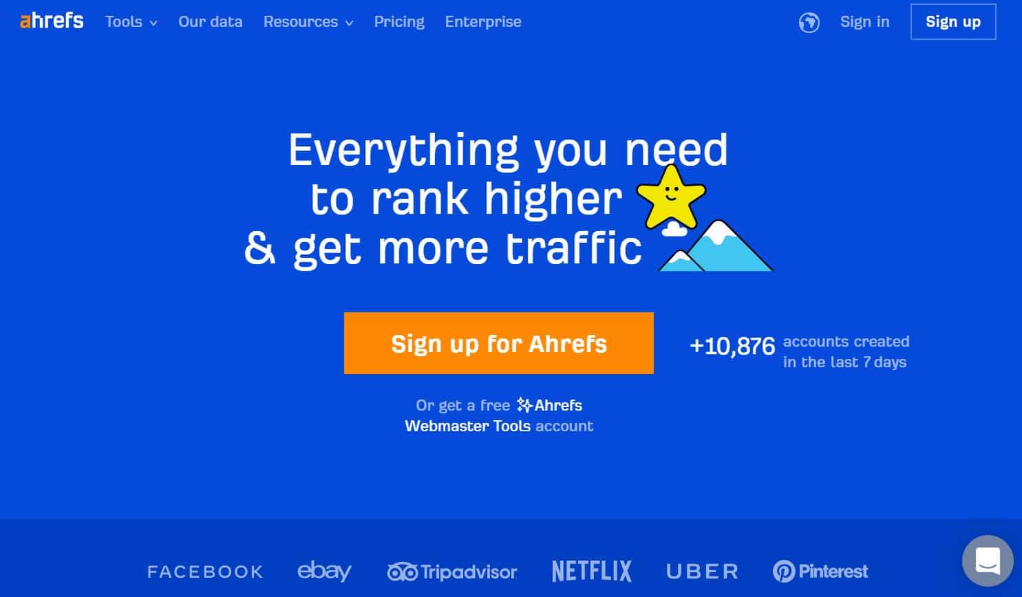 Домашняя страница Ahrefs со слоганом "Все, что вам нужно для повышения рейтинга и получения большего трафика".